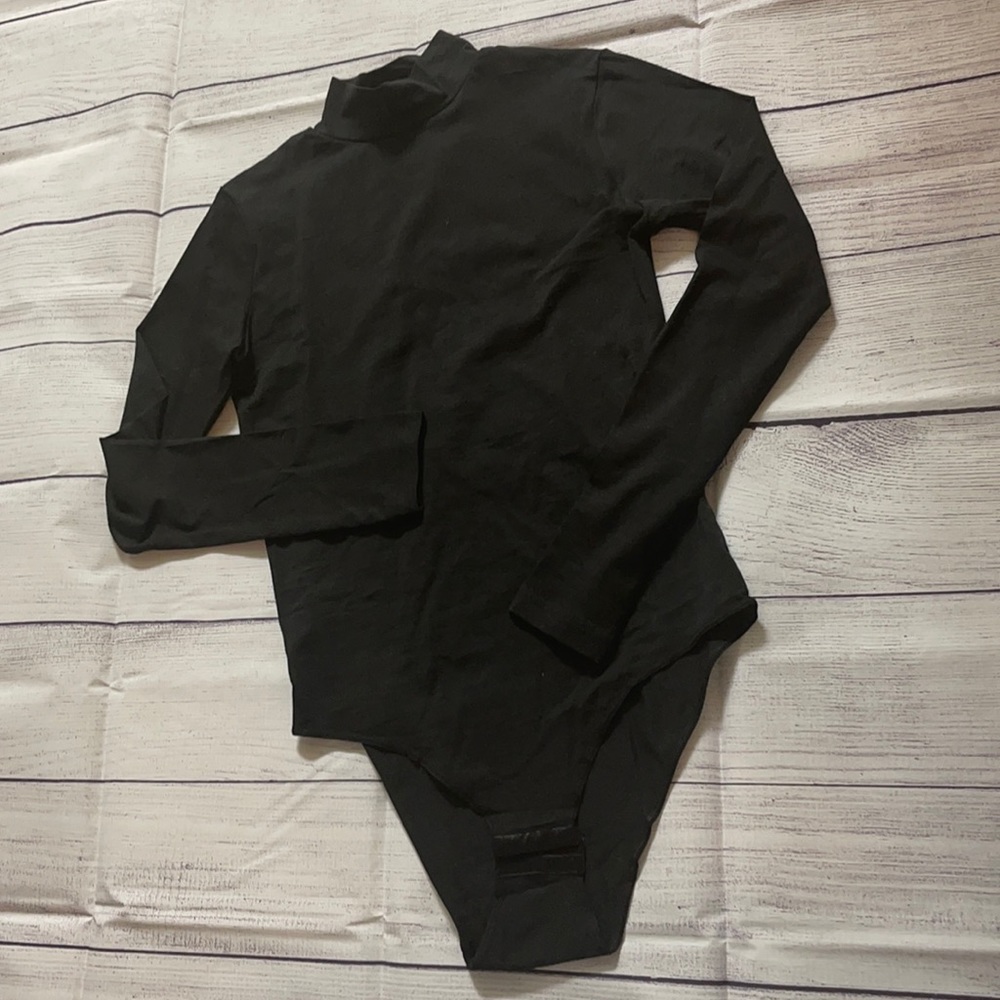 Black turtle neck bodysuit
